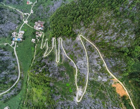 Ha Giang Vietnam - Aerial Drone View of Lacet Road (Hairpin Turns) on Mountainous Scenic Ha Giang Loop