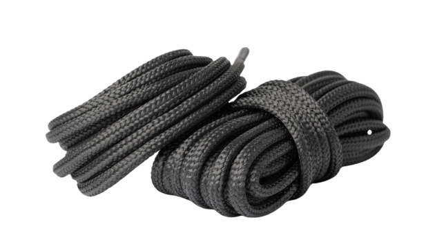 Pair of black shoelaces coiled neatly with aglets and looped design isolated on white background