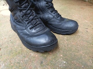 Pair of rundown combat boots