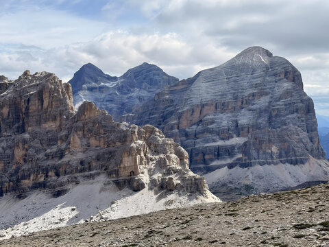 owering stone mountains rise beneath shifting skies, echoing age, silence, and grandeur