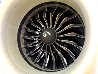 Close-up of an airplane turbofan engine with circular fan blades