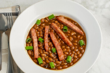 baked beans  with spam sticks  and green onions