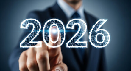 Business professional touching the year 2026 illustrating future technology and progress