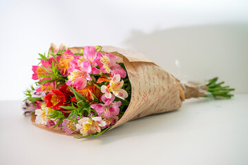beautiful fresh bouquet of alstroemeria on a light background