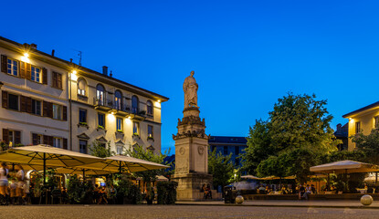 Neoclassical Volta Temple monument in Como, Italy, with columns, domed roof, and lakeside park...