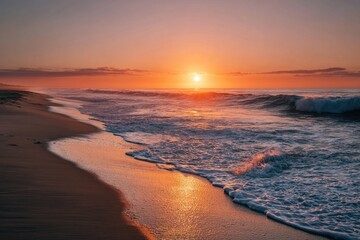 Golden sunrise over a beach.  Ocean waves meet the shore