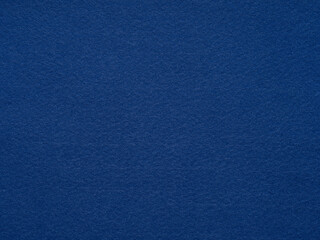 A deep sapphire felt texture invites contemplation, offering a luxurious and profound depth to the...