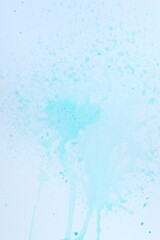 Abstract pattern drawn with blue paint on white paper background. Graphic resource.