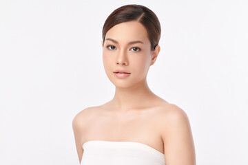 A beautiful young Asian woman with clean, fresh skin against a white background. Skincare, facial...