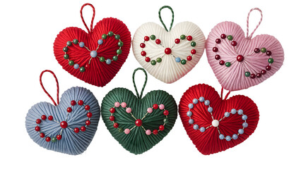Fototapeta premium Six colorful yarn heart ornaments with beaded designs hearts white