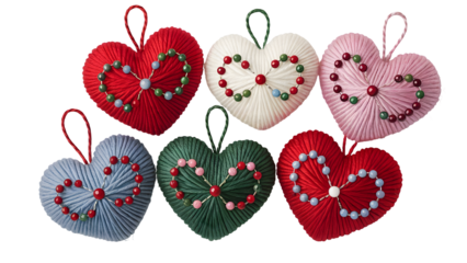 Six colorful yarn heart ornaments with beaded designs hearts white