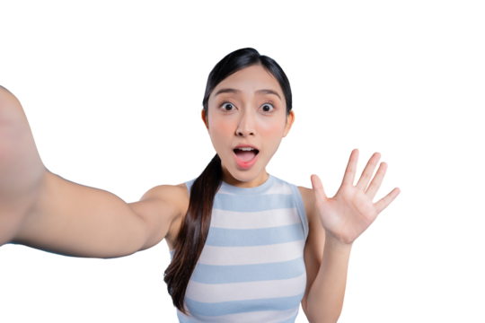 A young Asian girl with a surprised expression waving at the camera while taking a selfie on png background
 - Powered by Adobe
