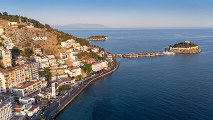 Naklejka premium Aerial view of Guvercinada Island (Pigeon Island) with scenic castle at Kusadasi, Turkey. The large resort town is a popular tourist destination in Turkey.