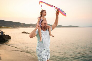 Joyful memories at the beach with family during sunset moments
