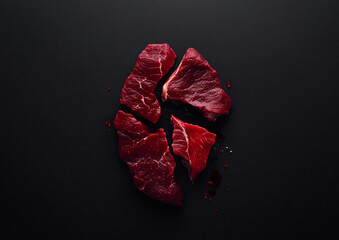 Creative advertising of fresh raw red beef slices for perfect steak on black background.Macro.AI Generative.