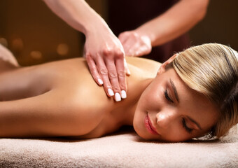 young woman receiving a massage