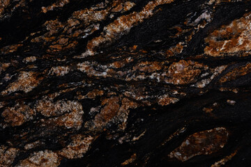 New Black Magma granite texture, background in attractive dark color.