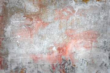 Texture background with the image of red  and white old plaster with cracks, abrasions and stains...