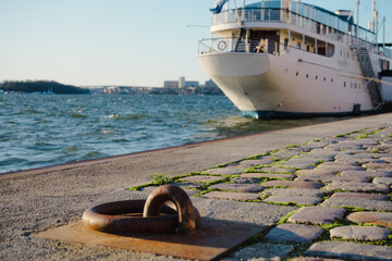 Close-up of paving stones at harbor