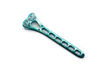 A Surgical Distal Radius Plate on a white background. A plate is used to fix a fractured a Radius...