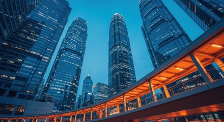 Modern Cityscape Architecture with Tall Skyscrapers and Elevated Walkway at Dusk