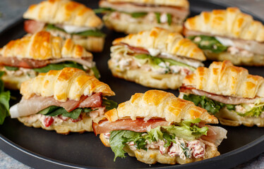 Mini croissant sandwiches.