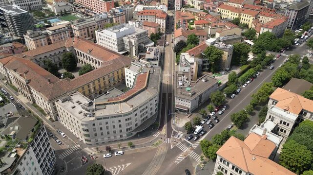 Urban Vista: An elevated shot showcases a vibrant city's architectural tapestry, with meticulously designed buildings and well-organized streets. An ode to the urban ecosystem.