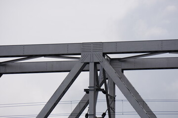 Naklejka premium Steel Truss Bridge Detail – Structural Engineering and Load Design