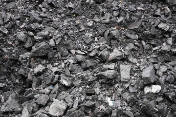 Pile of Crushed Coals and Gravel with Jagged Edges in Industrial Outdoor Setting