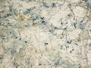 Unique textured wall with abstract patterns in muted colors
