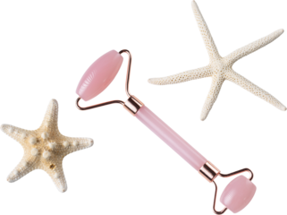Pink Gua Sha massage tool on a white background, close-up. Rose Quartz jade roller. Facial composition with starfish.
