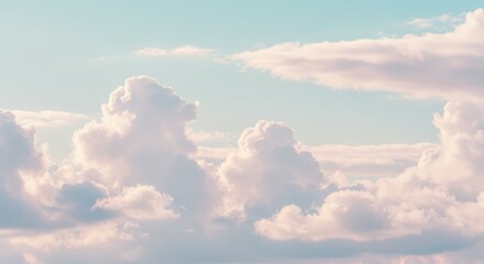 Fluffy White Clouds Against a Pale Blue Sky Dreamy Cloudscape