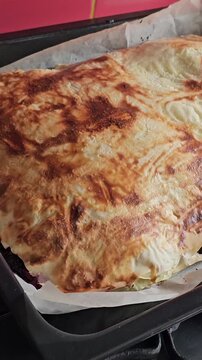 Delicious Homemade cheesy spinach quiche pie. spinach pie making process