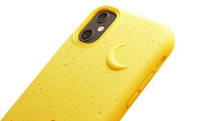 Close-up of a yellow phone case with a crescent moon design