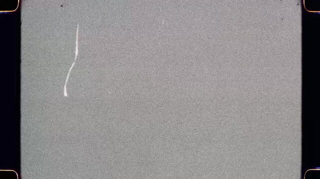 Soft Grainy 16mm Film Texture with Visible Sprockets and Flickering Film Leader