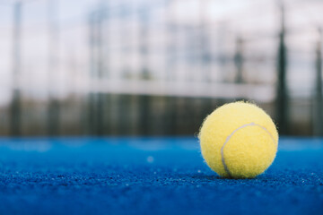 vibrant blue court with a yellow ball, concept sports background