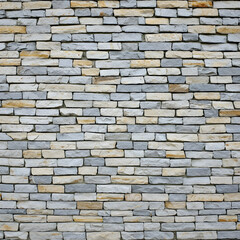 Obraz premium Grey and Beige Stone Brick Wall Texture Background Image
