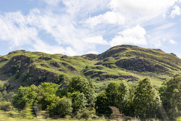Obraz premium Lake District landscape on a summer day with hills, mountains, walking paths