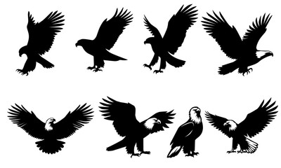 Set of black eagle silhouettes in various flying and landing poses