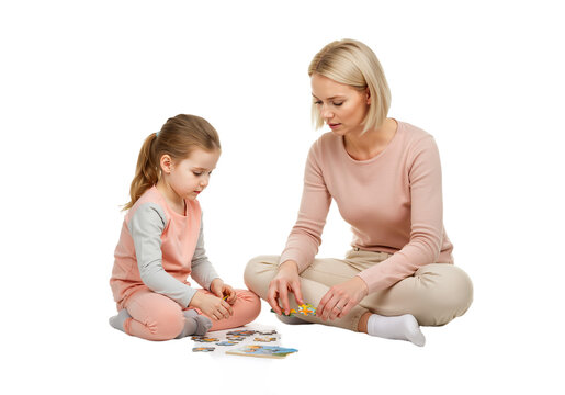 mother and daughter playing with puzzle