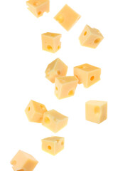 Obraz premium Cheese cubes in air against white background