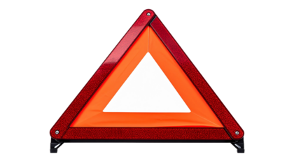 A red warning triangle on the road side. The triangle indicates caution to all drivers ahead. 
