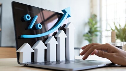 Laptop with growth chart and percentage symbol, inspiring success