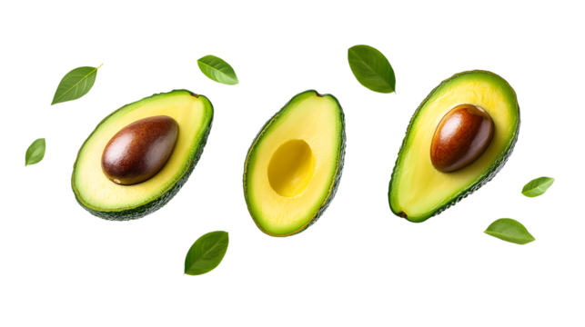 Fresh Avocado Halves With Seed And Green Leaves On White Background