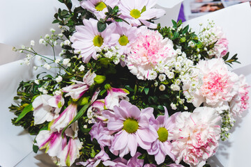 A luxurious bouquet of carnations, daisies, and gypsophila. Bunch of many colorful flowers....