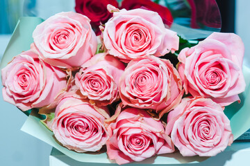A luxurious bouquet of pink roses. Bunch of many colorful fragrant flowers.