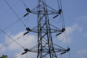 Close-up of the electric transmission against the clear blue sky background