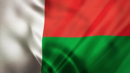 The national flag of Madagascar is a symbol of the republic that flies as a colorful flag in the wind and a real drapery, representing the country and the nation.