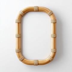 Obraz premium Oval shaped frame made of light brown bamboo.