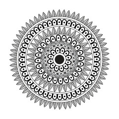 Intricate black and white mandala design with repeating patterns